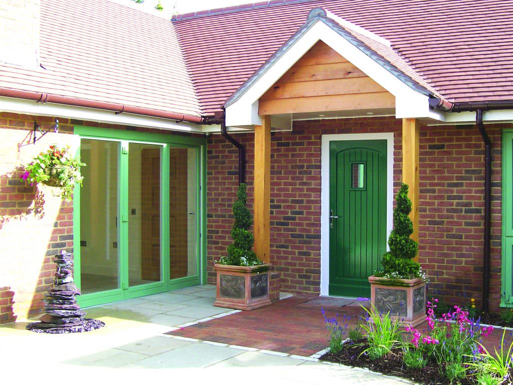 Chartwell green bi-folding sliding doors